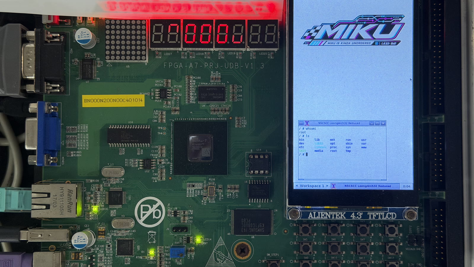 MIKU SoC running LoongArch32 Reduced Linux with a graphical desktop on the Artix-7 contest board